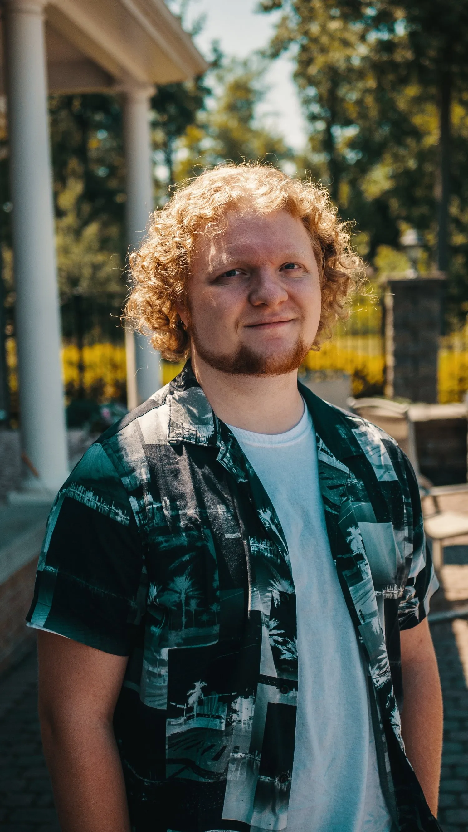 Connor Jones smiling on a sunny porch