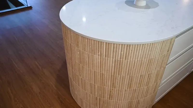 Poster frame of the Bellevue Heights video: a curved fluted-tile kitchen island and terracotta splashback