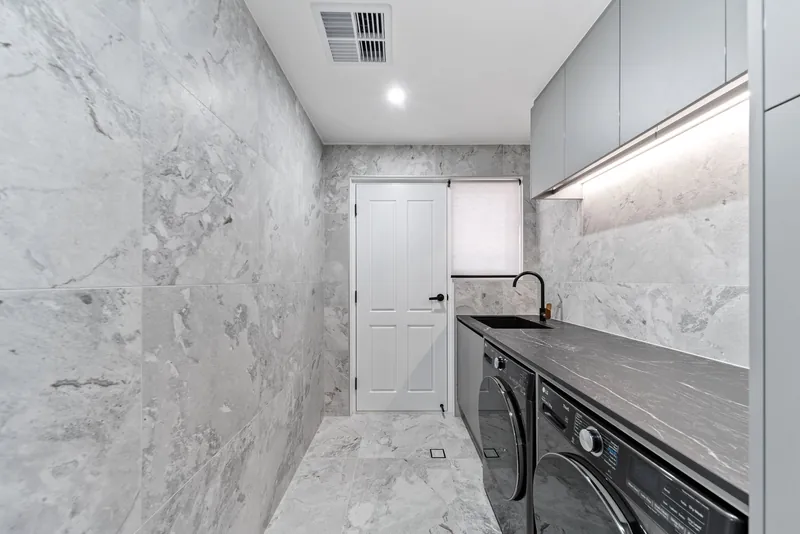 Laundry wall and floor tiling in Craigburn Farm