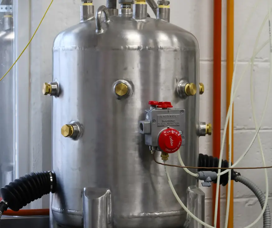 Stainless steel test vessel with valves and gauges
