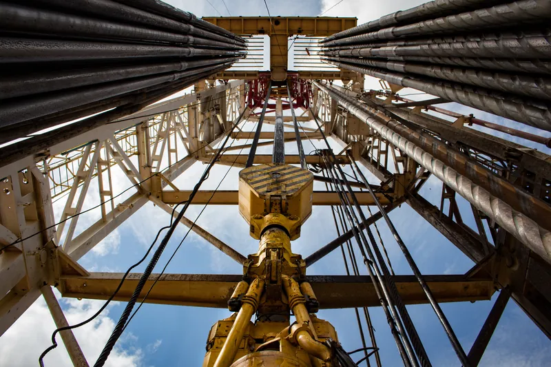 Looking up inside a drilling rig derrick