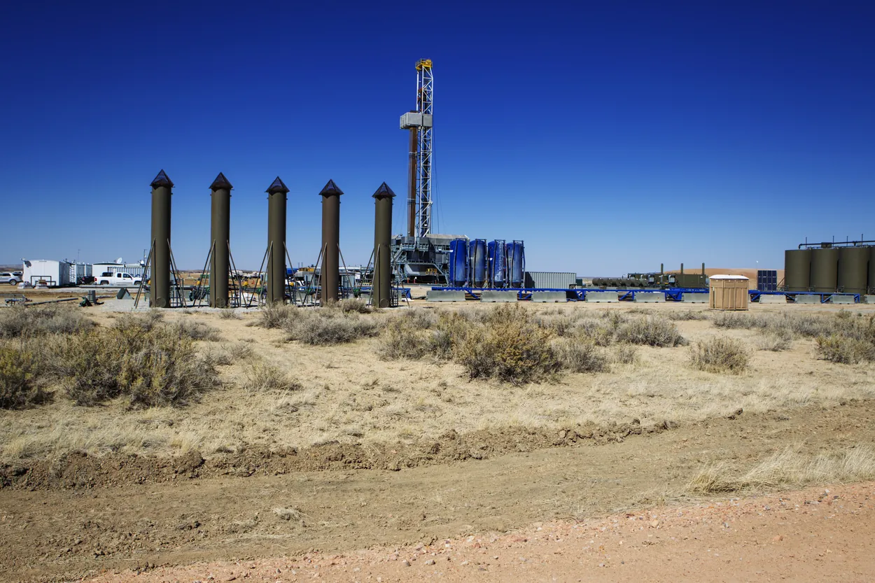 Drilling rig and equipment on a desert location