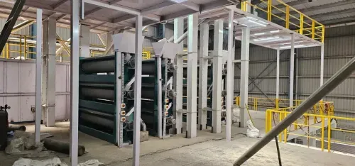 Somnath graders on a rice mill mezzanine
