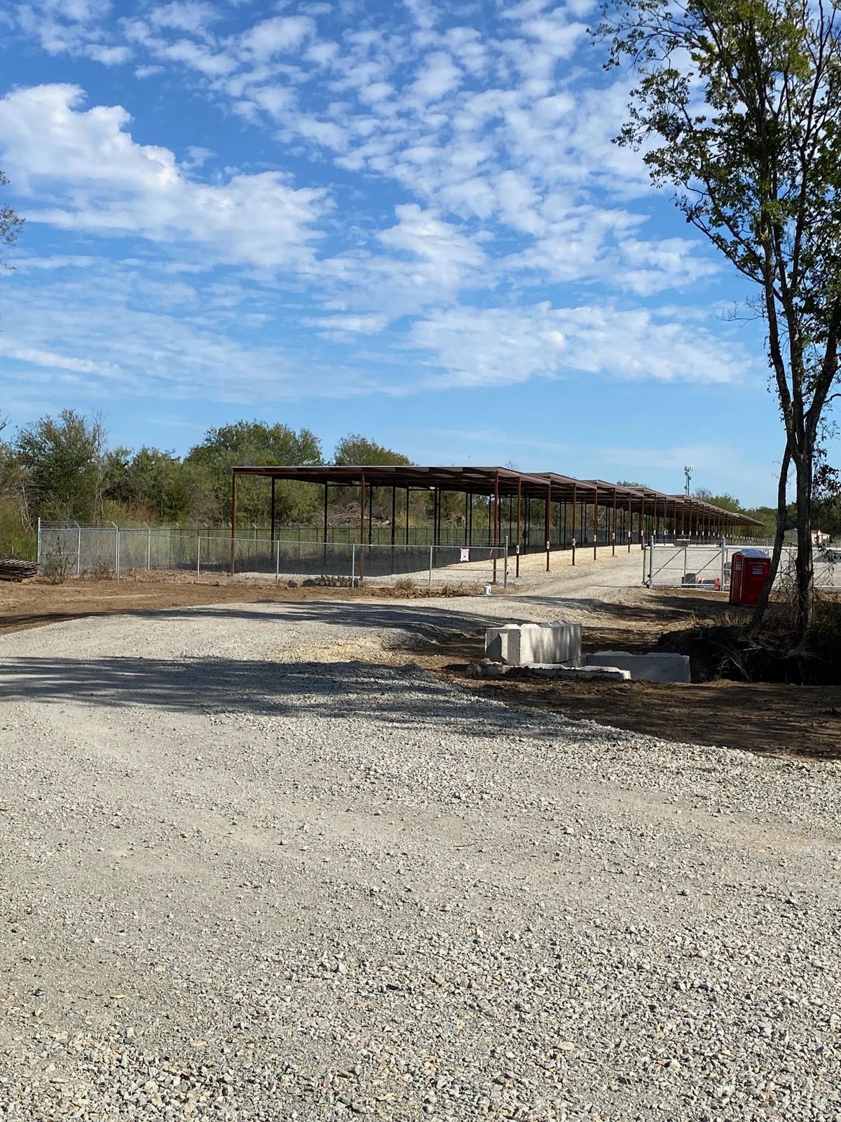 Covered RV and boat parking at Liberty RV Storage in Corsicana, TX