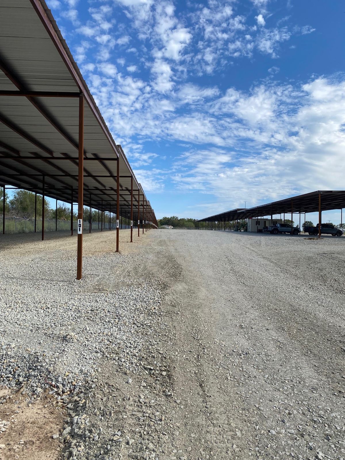 Row of covered parking spaces at Liberty RV Storage