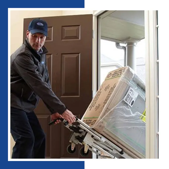 E.A.C. installer delivering new Carrier equipment to a home