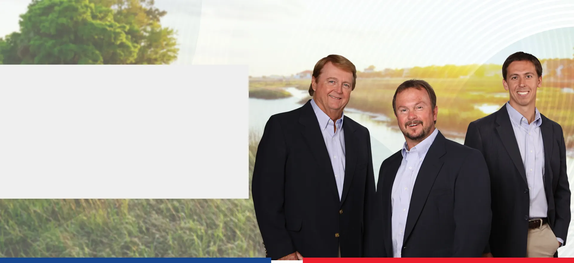 The E.A.C. Heating & Air family leadership team in front of a Lowcountry marsh