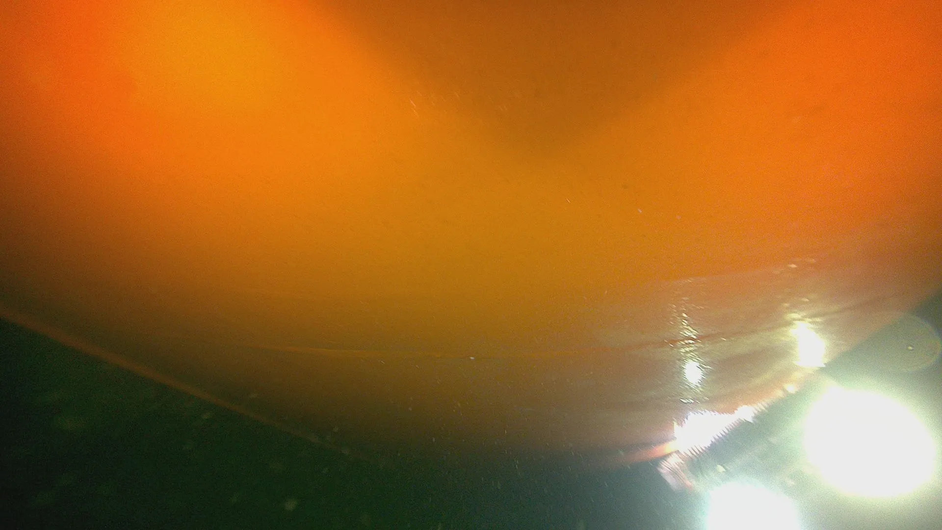 The same hull coating after cleaning: clean, smooth orange surface