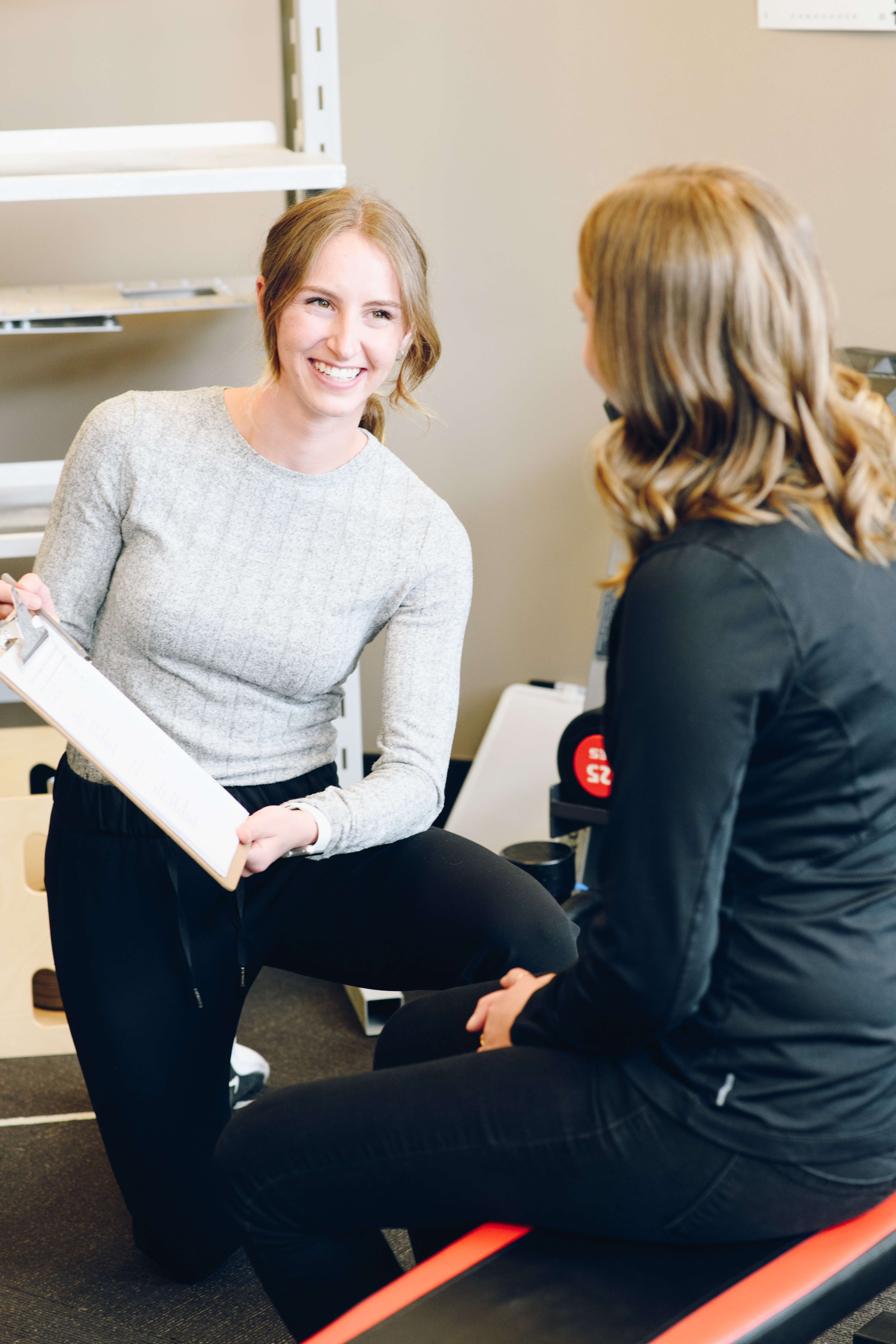 CTC clinician going over results with a client on a clipboard