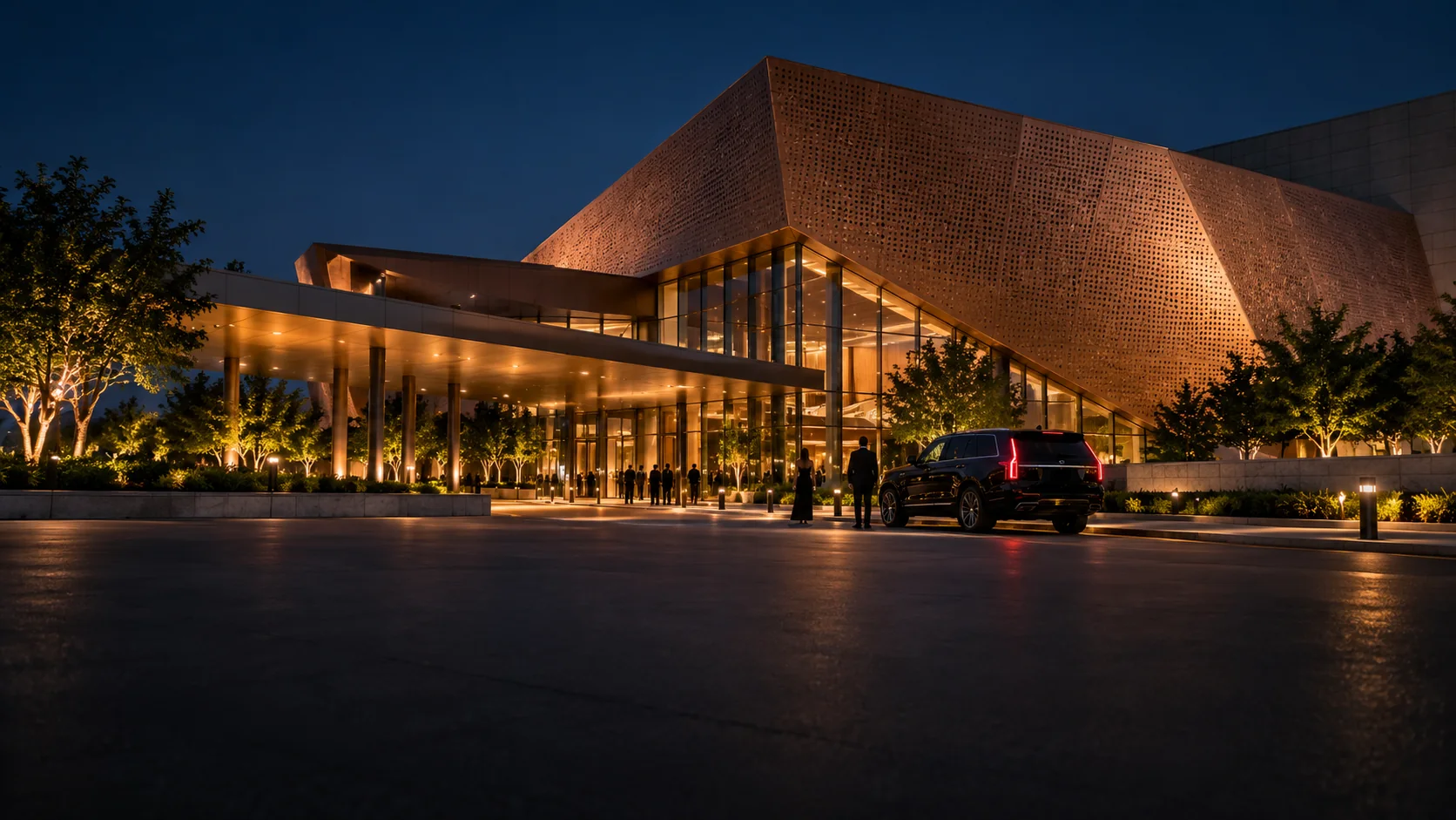 Black SUV car service outside the Irving Convention Center in Irving, Texas at night