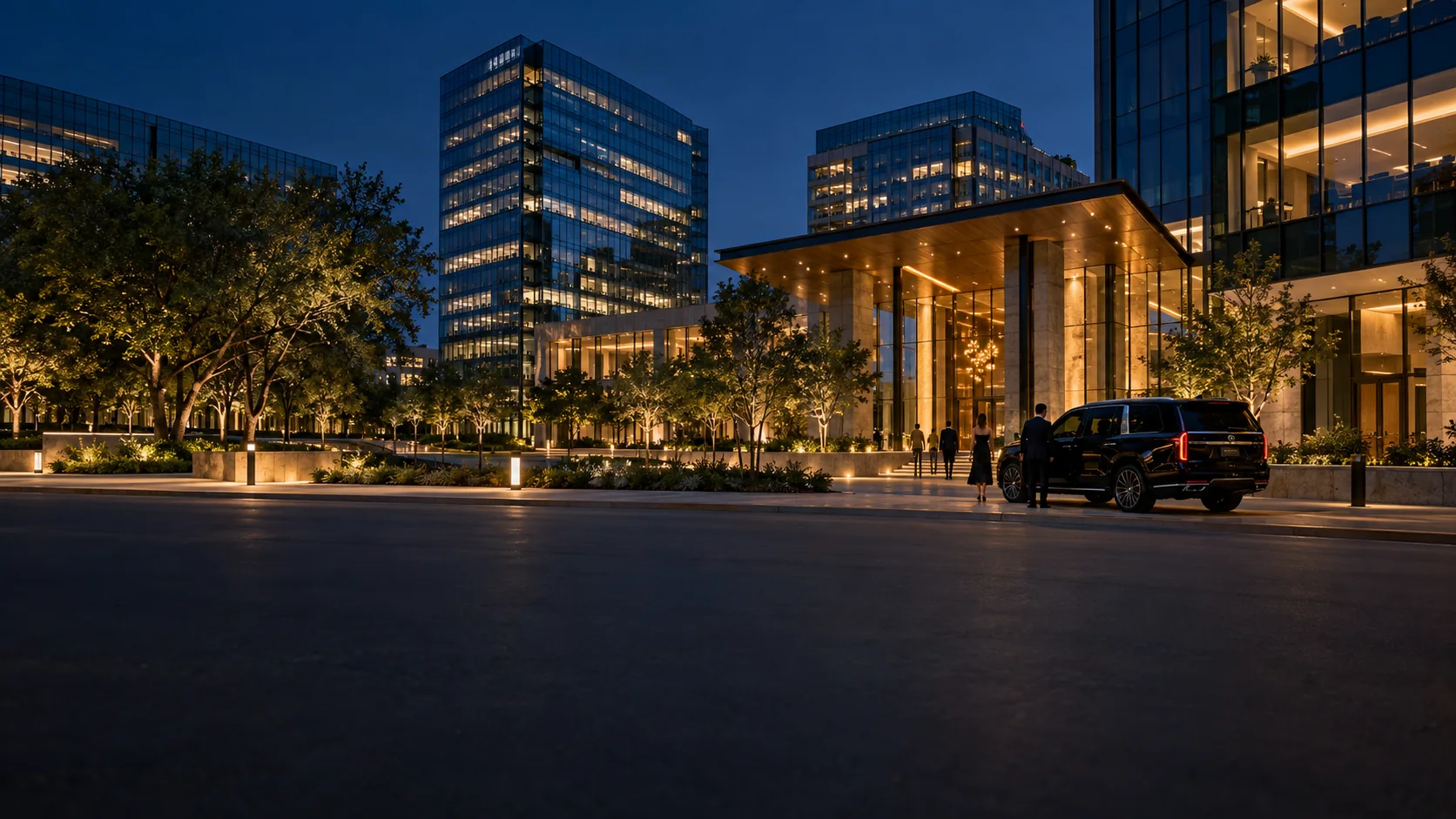 Black SUV black car service outside office towers in Richardson, Texas at night