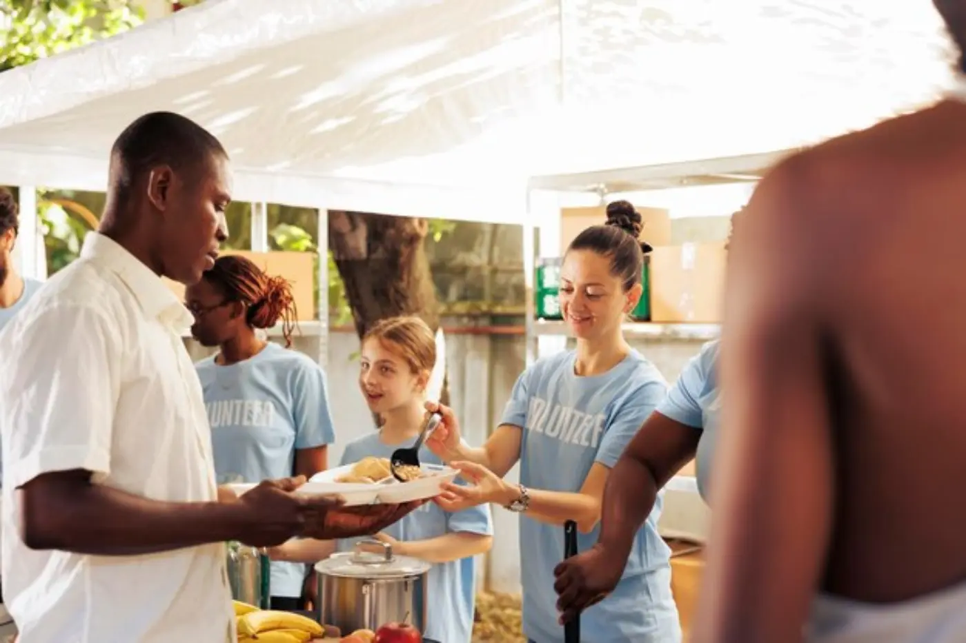 Charity volunteers handing out food