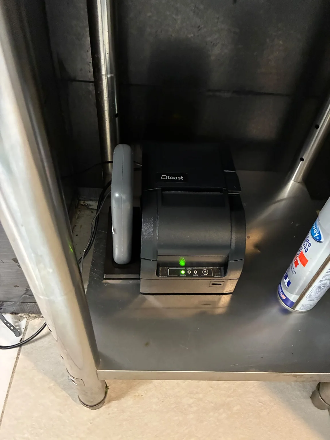 Ticket printer installed under the counter at The LayUp