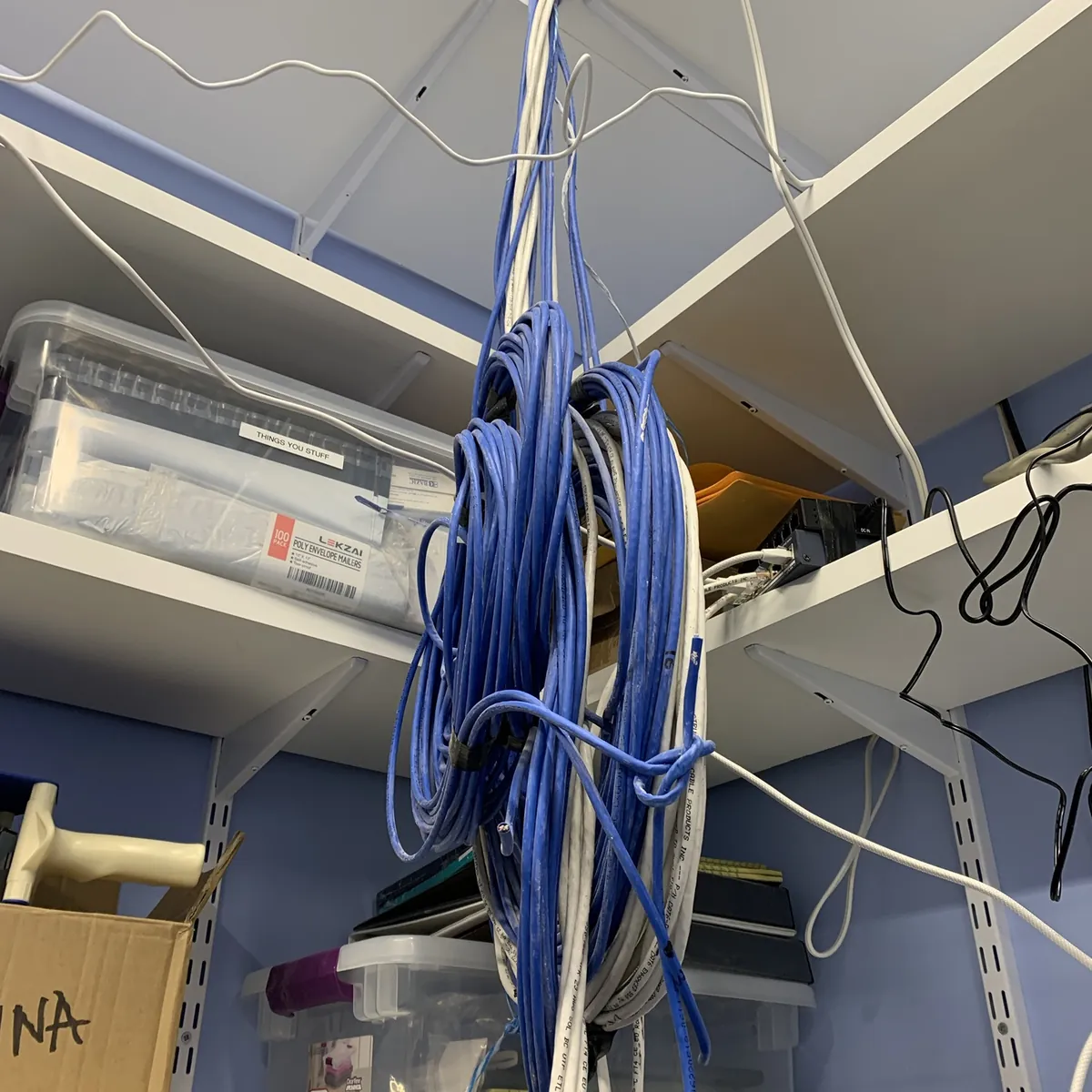 Coiled Cat6 cable runs dropped from the ceiling