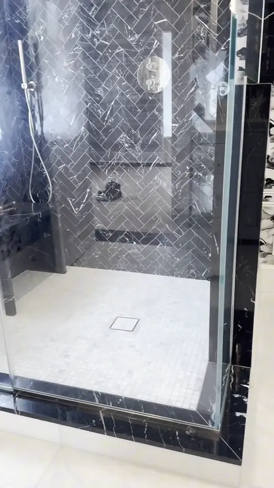 Dark herringbone shower