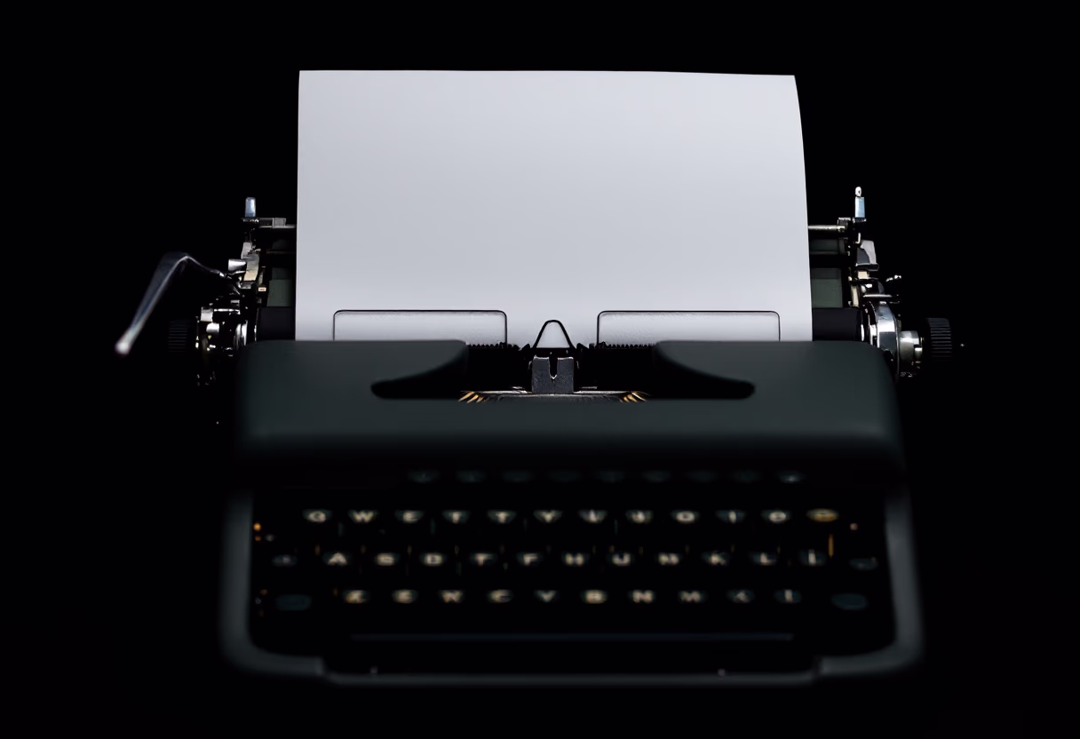 image of typewriter with paper for a writer