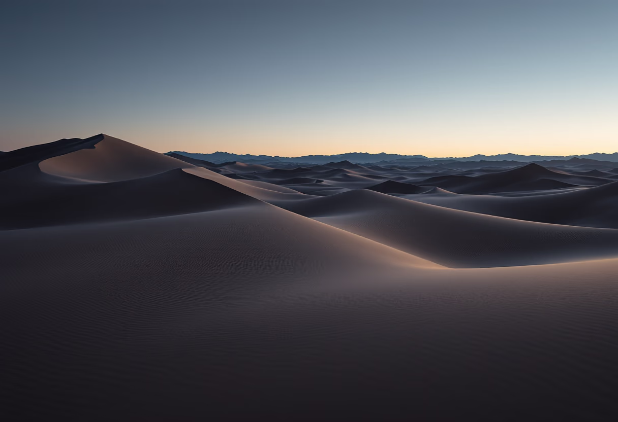 image of a vast desert landscape at dusk, part of a travel agency's scenery photos for their website